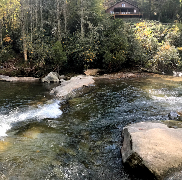 a cabin by the river